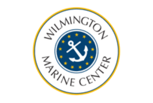 Logo of Wilmington Marine Center, a customer-friendly business, featuring a blue circle with a white anchor in the center, surrounded by stars and the name in gold.